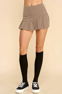 KNIFE PLEATED SKORT: FRENCH TAUPE