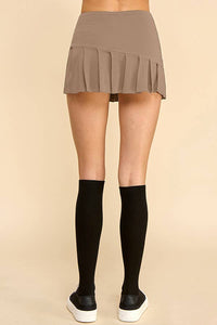KNIFE PLEATED SKORT: FRENCH TAUPE